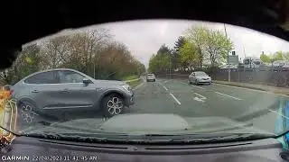 Car pulls out due to blind spot.