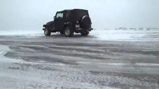 The wind blowing the snow and sand.MP4