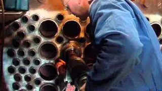 Installing flue tubes in the boiler of a steam loco, Ropley, Mid Hants Railway, UK
