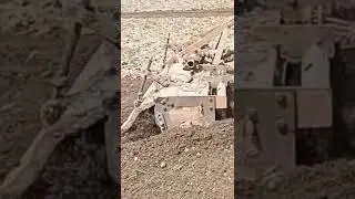 Rotovator on work at agriculture Farm