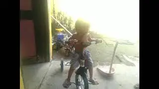 cute kid - learn to ride a bicycle