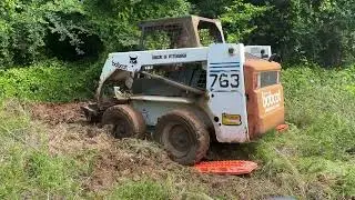 Maxtrax are not just for Jeeps.  Getting our BobCat 763 out of some deep wet sand in Mabank, Texas.