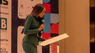 Smooth as silk! Pan-African event host at work.