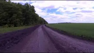 Поездка по полям на мотовелосипеде...