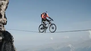Kenny Belaey Rides Bike Across 60ft Slackline