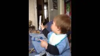 Левка управляет телевизором
