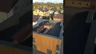 Современный дом с эксплуатируемой плоской крышей