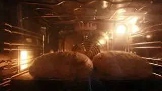Bröd som jäser i ugnen
