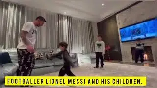 Lionel Messi and his sons play football in his living room.