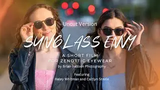 A friend helps protect another's eyes with Zenottic Sunglasses, but one just can't let go of them!