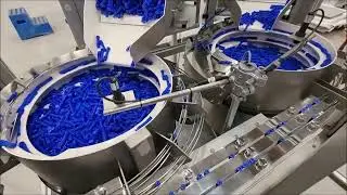 Vibratory Bowl Feeders feed and orientate handles - RNA Automation Ltd