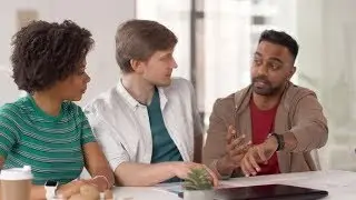 Man Showing Smart Watch To Coworkers at Office 31 Stock  | Videohive Project Templates