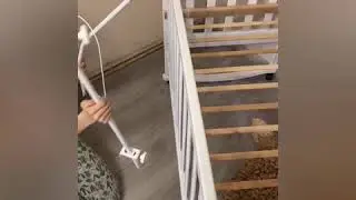 Attaching the canopy holder to the crib