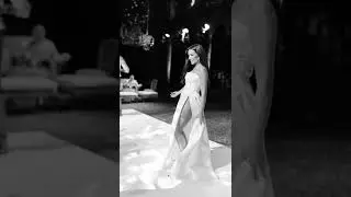 My reception dress! dress number 2 was the Dana Harel Tara gown  recommend a high slit  for dancing!