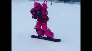 Snowboarding Gundam suit on slopes