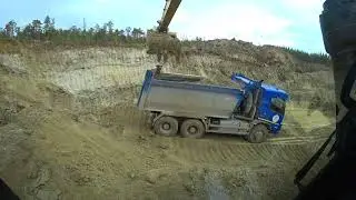 Боковая погрузка самосвала Volvo. Excavator cat 330 gc. Loading a dump truck