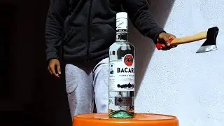 Breaking a Bacardi Bottle In Slow Motion
