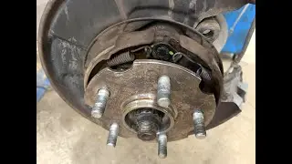 Replacing brake discs on a Toyota RAV4.