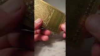weird gold-plated, $100