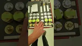 Station 2 - V1 Loading the Parts Into the Stirling Engine Fixture