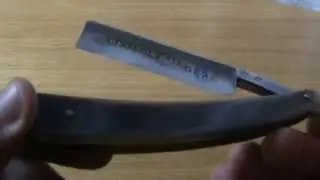 Revisor 8/8 straight razor, full hollow, horn scale