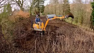 Ground works with the mini digger and quad bucket