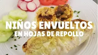 Niños Envueltos en Hojas de Repollo