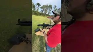 Shooting a MP5 9mm with a swamp fox red dot.