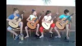 Дети играют на гитаре танго. Tango.  children play on the guitar