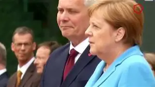 Merkel yenə titrədi