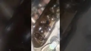 Left side of Motor with valve covers off While Running