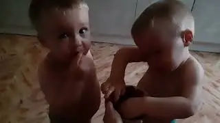 Twins eat the gifts of summer