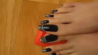Silver french on black toenails