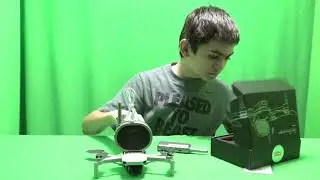 DJI Mavic Mini with megaphone speakers top mounted