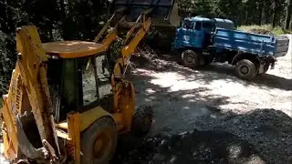 IFA L60 and Hidromek working in the forest