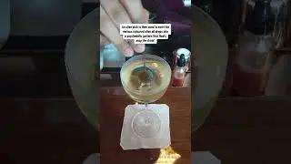 how Singapore's Republic Bar decorates its iconic cocktail with... coloured olive oil?!