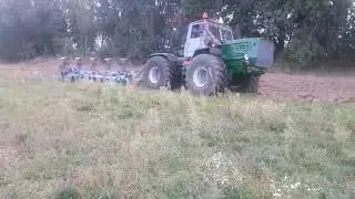 Т-150 на колесах К-700  з двигуном man 0826 + Lemken на максимальнім углі захвату