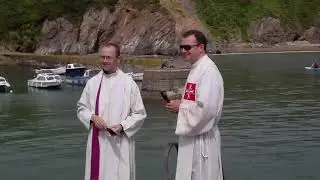 Father Paul Murphy and another Priest blessing the fishing boats at Boatstrand  3rd July 2010.