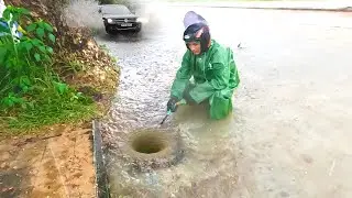 Draining Heavy Roadway Floods by Clearing Storm Drain Blockages