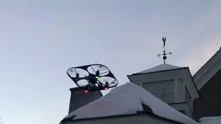 FreeBird One Scrapes Snow From Roof With Front Attachment