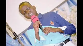 Frère Emmanuel Musongo avec son élève Exaucé dans 