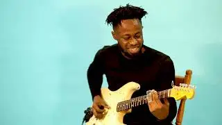 Linguist improvising over kwaw tune with a Slide Bottle