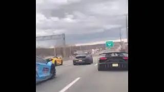 Runs between Porsche Audi R8 Lamborghini on highway