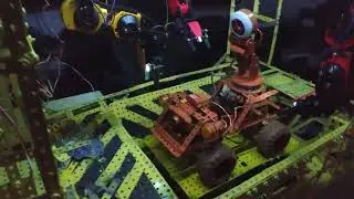 Lowering a vehicle in the engineering bay with manual control.
