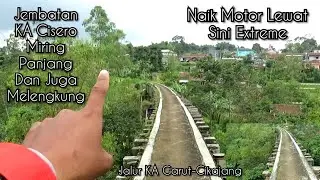 The Cisero/Cisurupan railway bridge is long, sloping, and also curved.