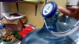 Cara Membuka  Tutup Galon