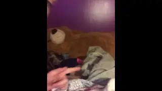 Tickling my sis while she is sleeping