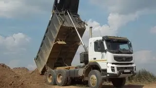 Volvo FMX 6x6 tipper unloading