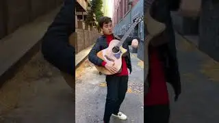 Marcin plays Michael Jackson's "Beat It" on acoustic guitar (Clip)