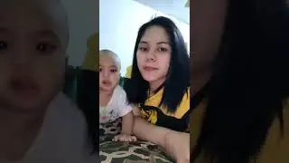 BREASTFEEDING BABY BY BEAUTIFUL MOTHER.